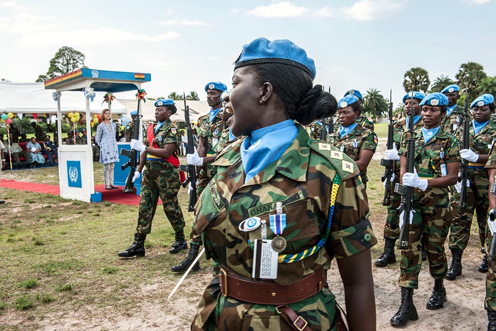 UNMIL Special Representative Karin Landgren reviews Ghanaian peacekeepers during a medal الفقرةde in Buchanan, Liberia, Friday, in 2012. UNMIL Photo/Staton Winter