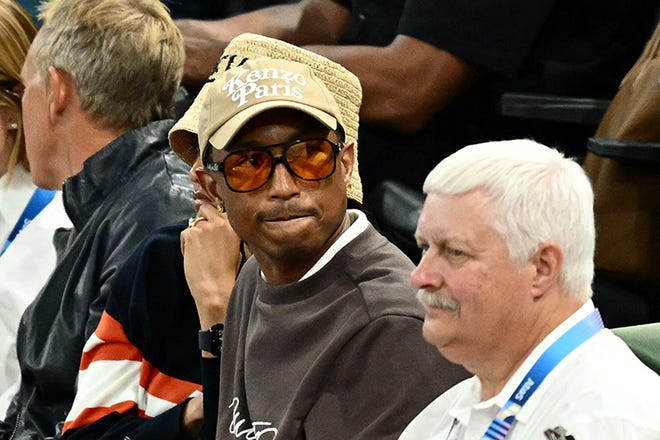 US singer Pharell Williams attends the artistic gymnastics men's floor exercise final during the Paris 2024 Olympic Games at the Bercy Arena in Paris, on August 3, 2024.