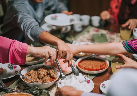 People sharing food at a table