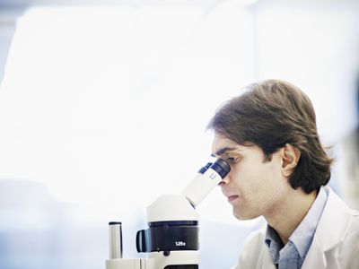 Researcher conducting a double-blind study