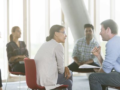 People sitting in a circle talking