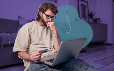 Original photo composite of man on his computer holding a credit card with a fishing hook in front of him