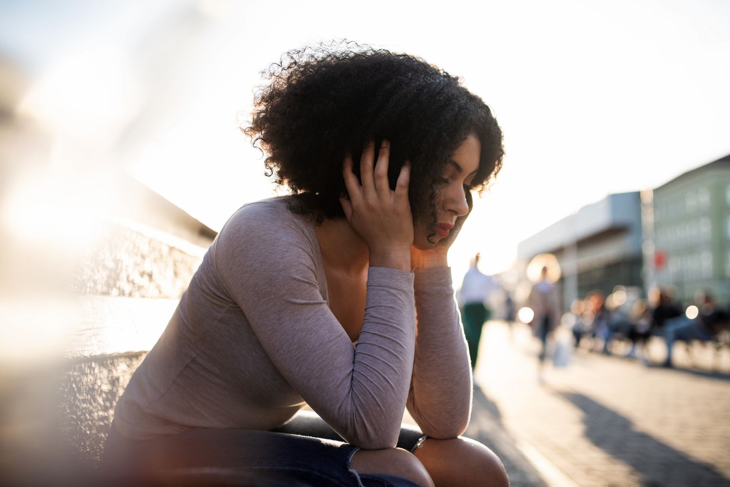 Unhappy young woman feeling low