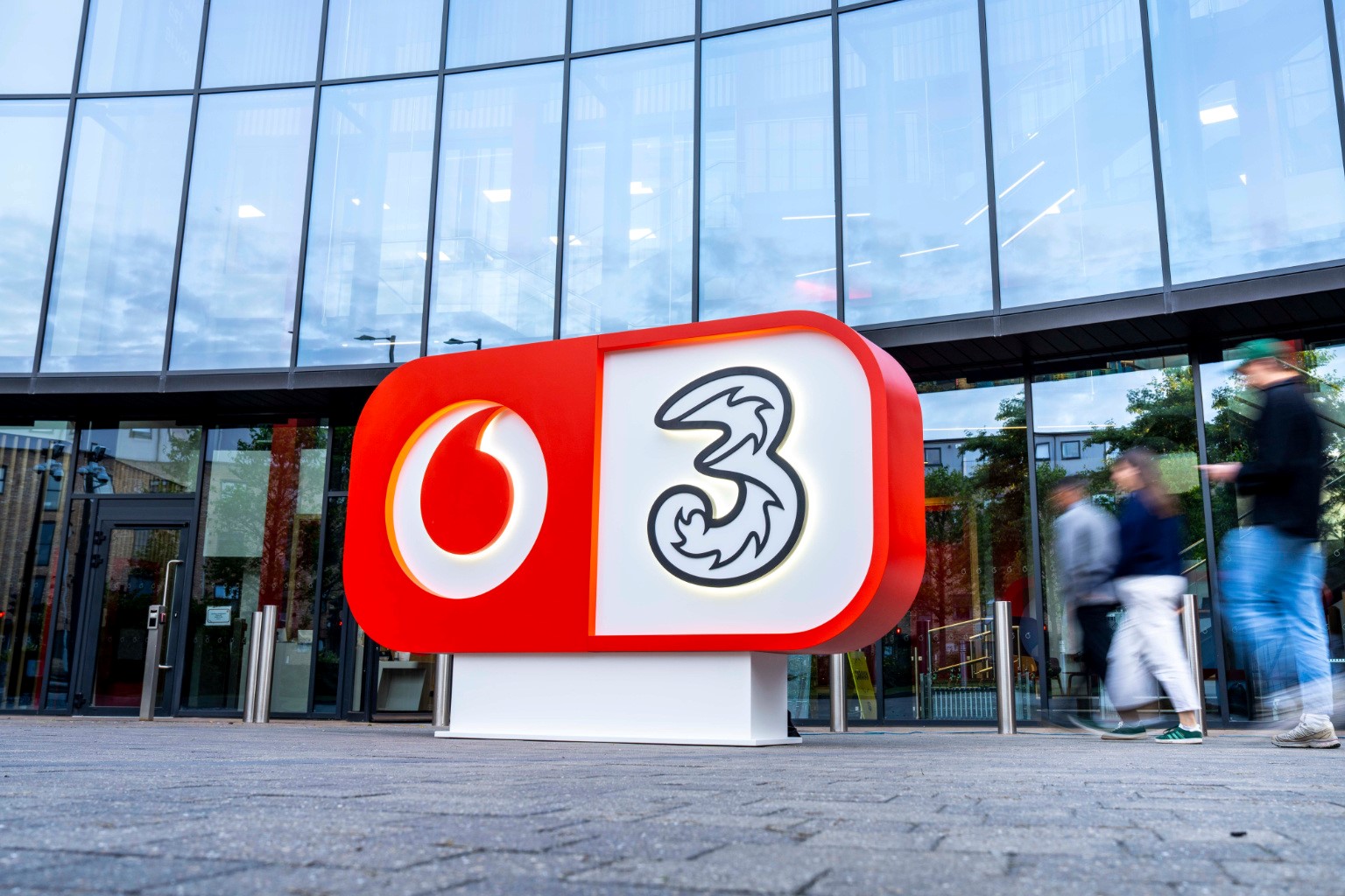 VodafoneThree logo outside of Speechmark office, London.