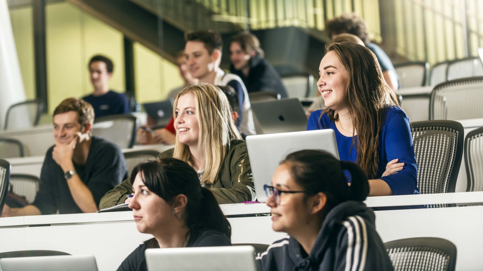 Gina Murphy is sitting with other students in a lecture theatre in Te Toki a Rata Building.