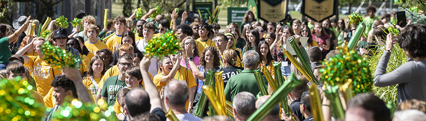 photo of students, faculty and staff at an event on campus