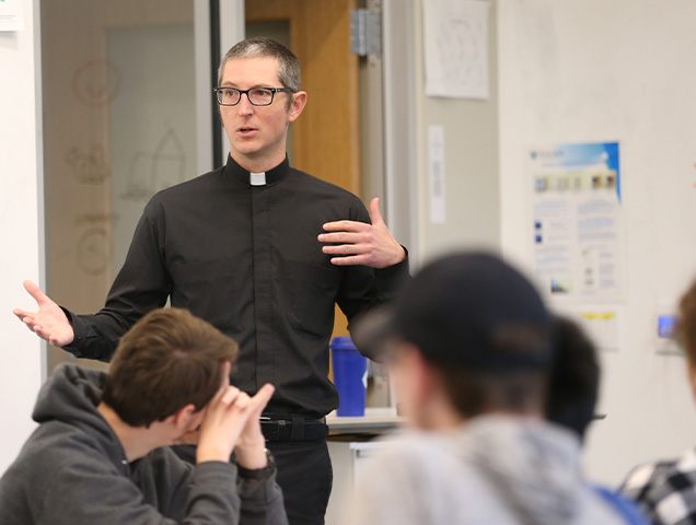 Students in a classroom with a professor